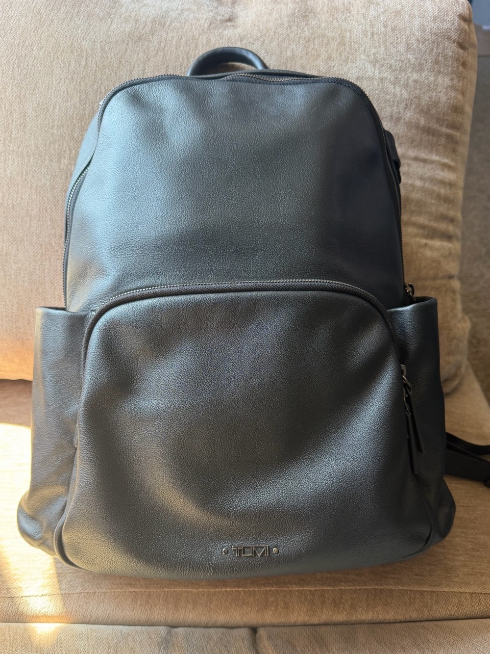 Tumi Black Leather Men's Backpack with Front Zip Pocket